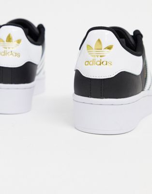 adidas Originals - Superstar Bold - Sneakers nere e bianche con plateau |  ASOS
