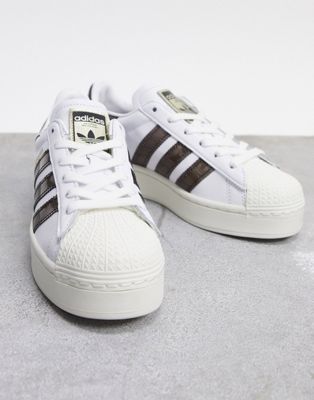adidas Originals Superstar bold style trainers in white and brown 