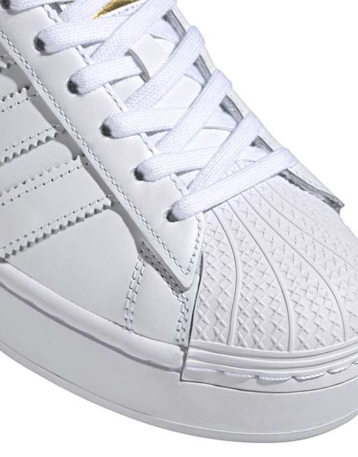 adidas Originals Superstar Bold trainers in white and gold ASOS