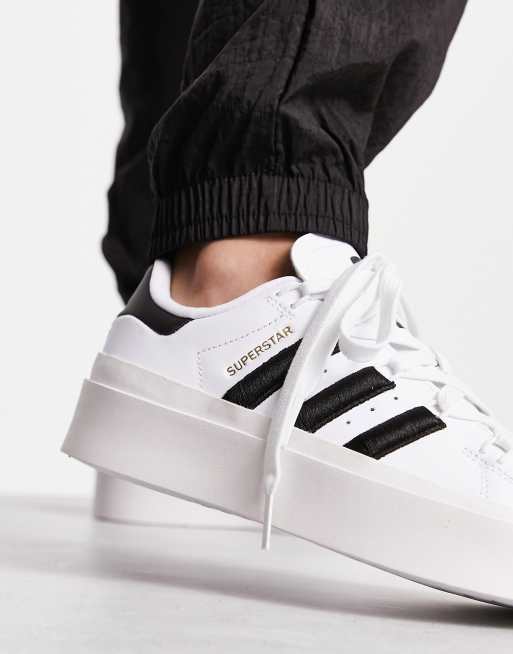 adidas Originals Superstar Bonega platform sneakers in white and black