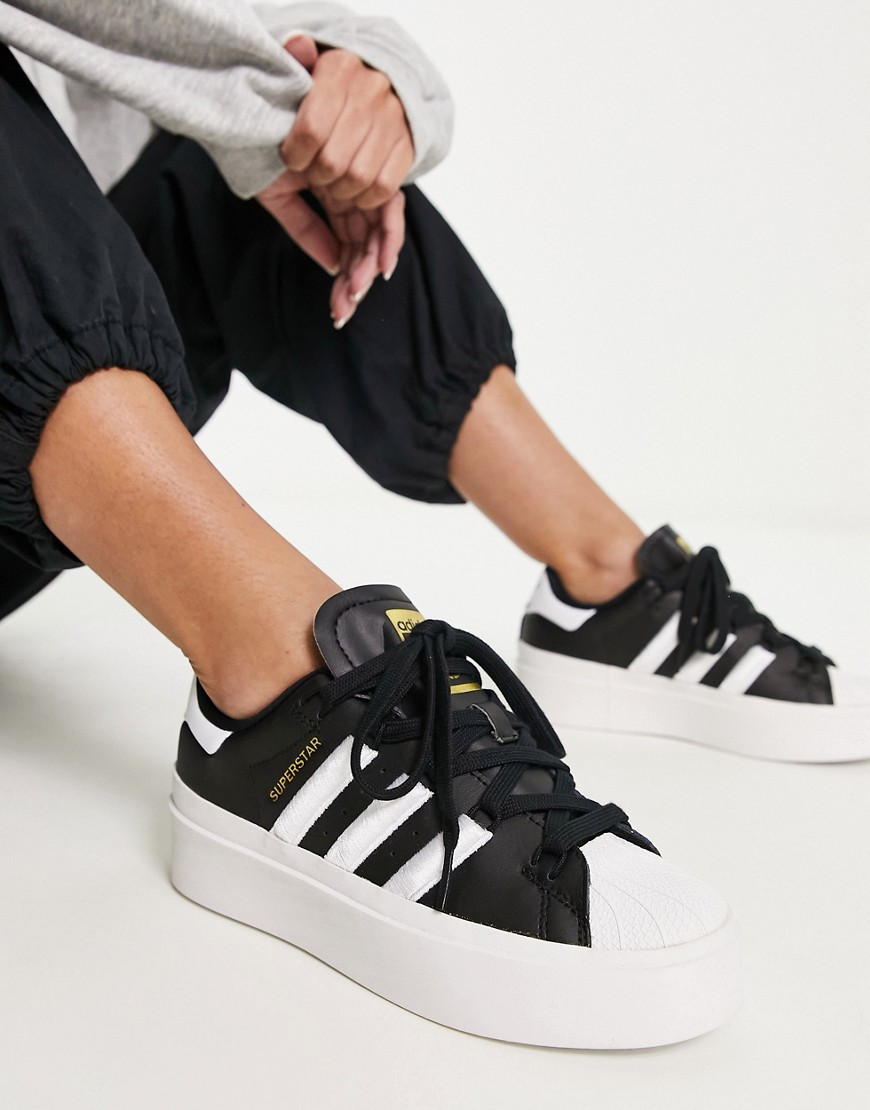 adidas Originals Superstar Bonega sneakers in black and white