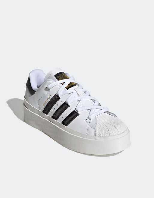 adidas Originals Superstar Bonega sneakers in white and black | ASOS