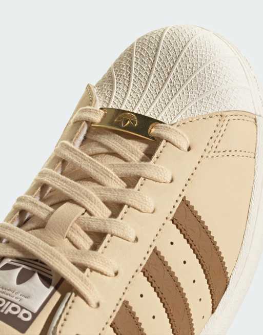 Superstar blanche sales et beige