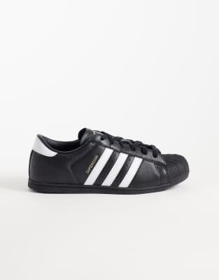 adidas Originals Superstar II lo pro trainers in black and white