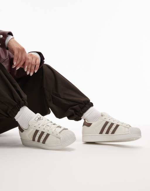 adidas Originals Superstar II sneakers in white with pony hair stripes in brown 