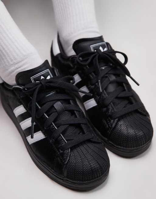 Shoes Superstar Nere Con Le Strisce Bianche Adidas Originals