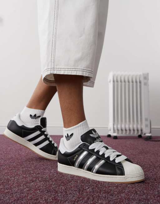 adidas Originals Superstar korn sneakers in black and white