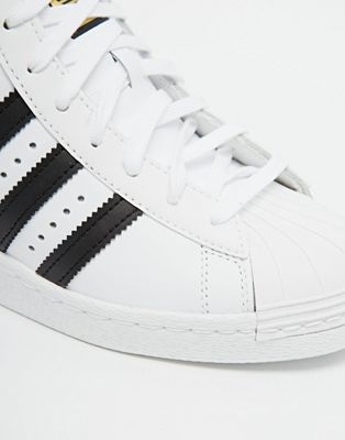 Adidas Originals - Superstar - Scarpe da ginnastica alte bianche con zeppa  nascosta | ASOS