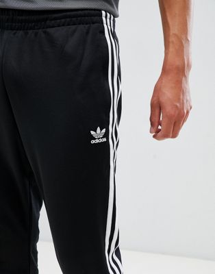 adidas originals superstar skinny joggers cuffed in black cw1275