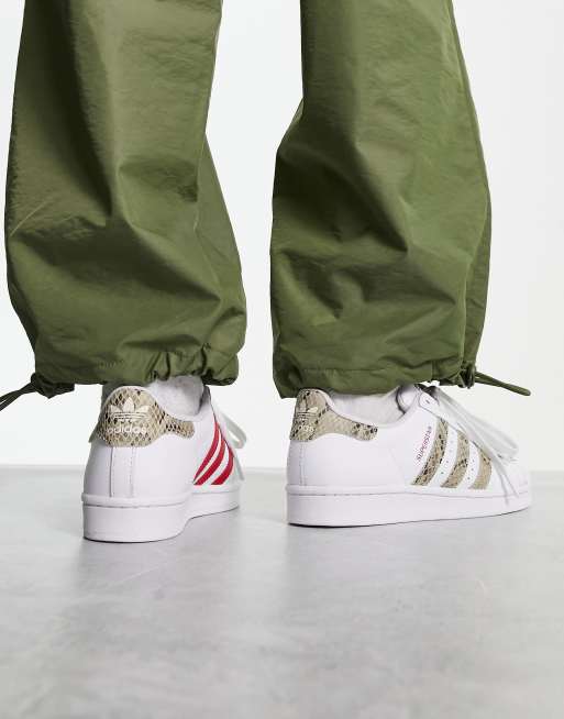 adidas Originals Superstar snake print sneakers in white ASOS