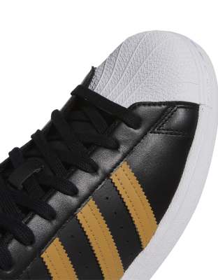 adidas negros super star