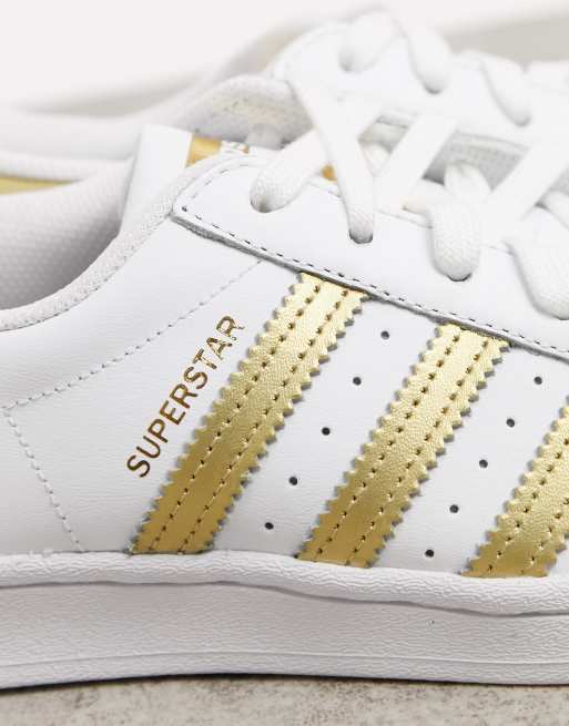 Superstar bianche con strisce oro clearance