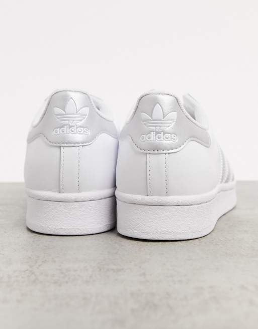 Adidas superstar bianche con cheap strisce argento