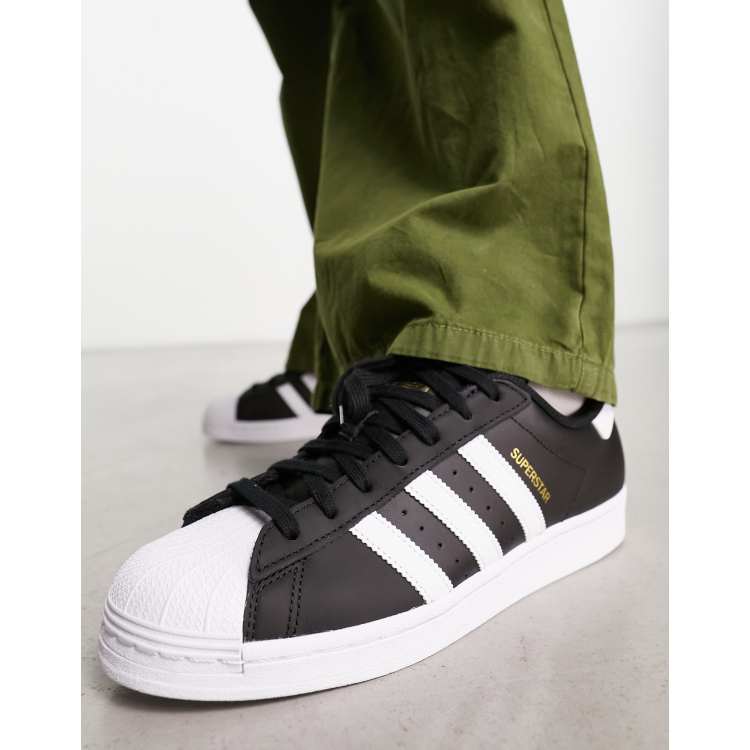 All black adidas discount with white stripes