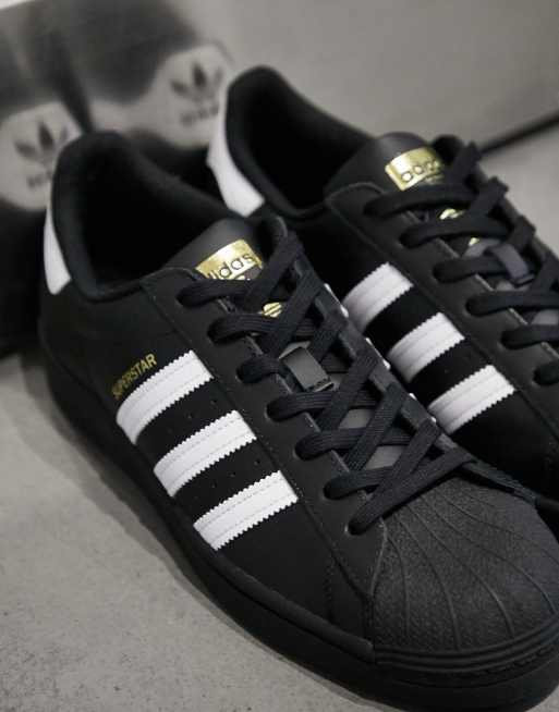 Strippen Gearceerd gebied adidas Originals Superstar sneakers in black | ASOS