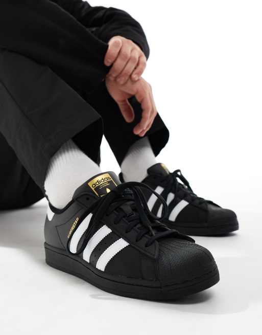 Black on black sales adidas sneakers