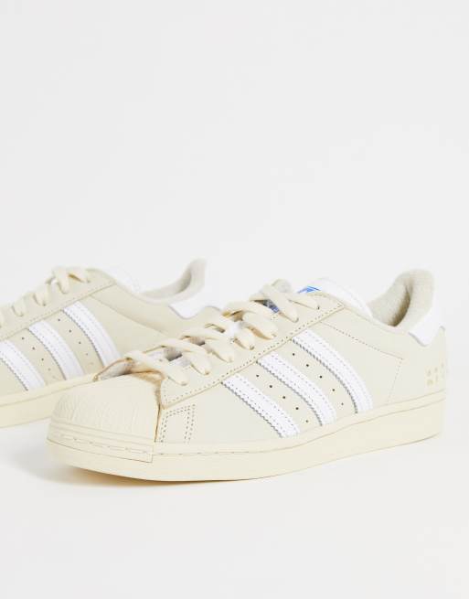 adidas Originals Superstar sneakers in cream