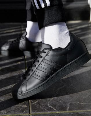 adidas Originals Superstar sneakers in triple black | ASOS