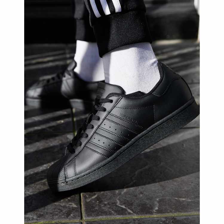 adidas Originals Superstar sneakers in triple black | ASOS