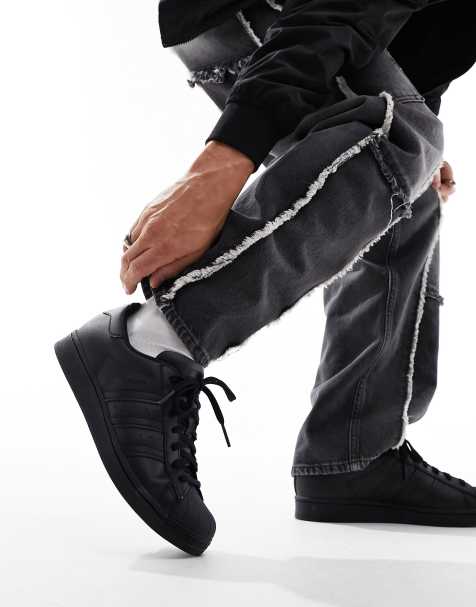 adidas Originals Superstar sneakers in triple black - view 1