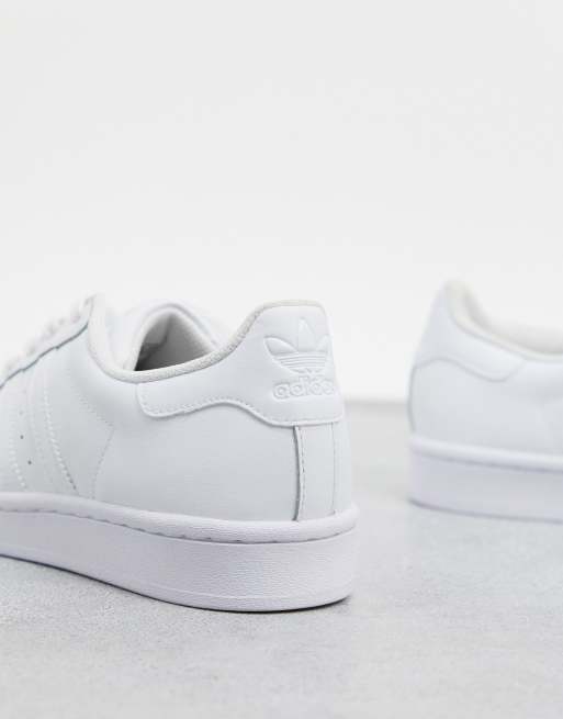 Adidas triple store white shoes