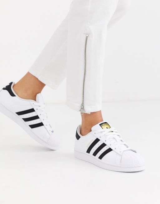 Adidas originals superstar trainers in white hot sale and black