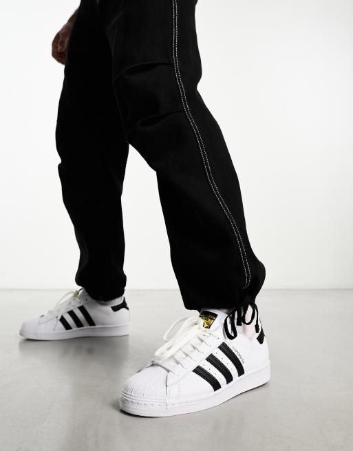 Adidas superstar sneakers discount in white and black