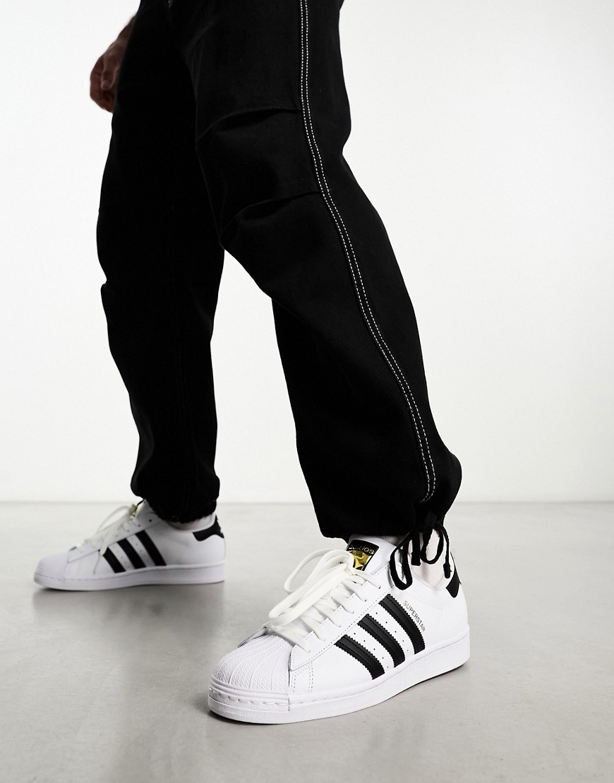 Adidas Originals Superstar Sneakers In White And Black