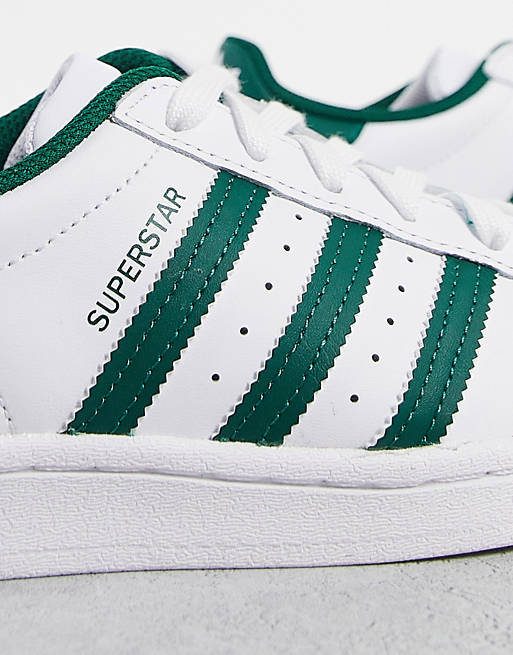 adidas Originals sneakers in and green |