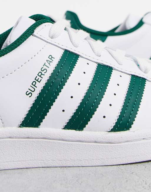 White shoes with green stripes sale