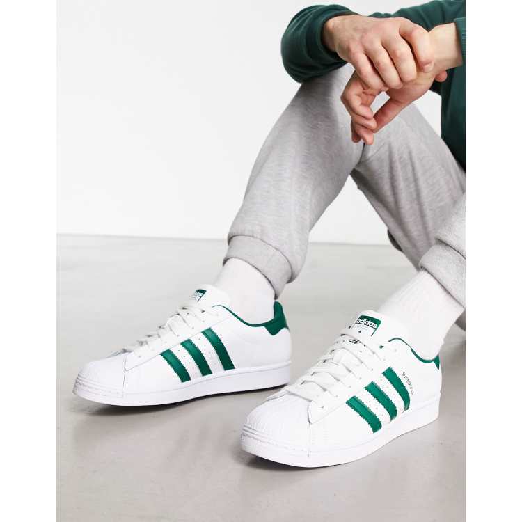 Originals Superstar sneakers in white and green |