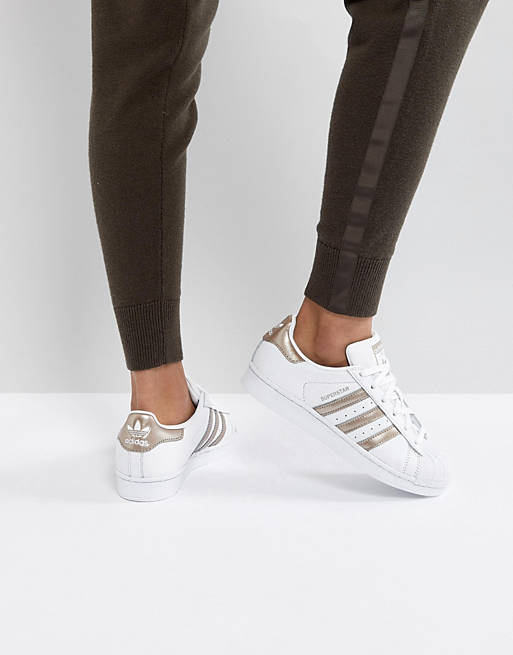adidas Originals Superstar Sneakers In White And Rose Gold