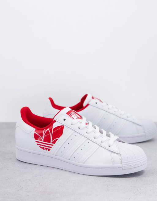 adidas Originals Superstar sneakers in white and scarlet