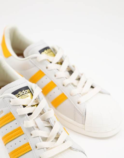 Adidas white sale and yellow