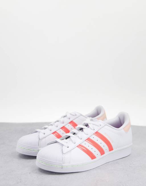 white and baby pink superstars
