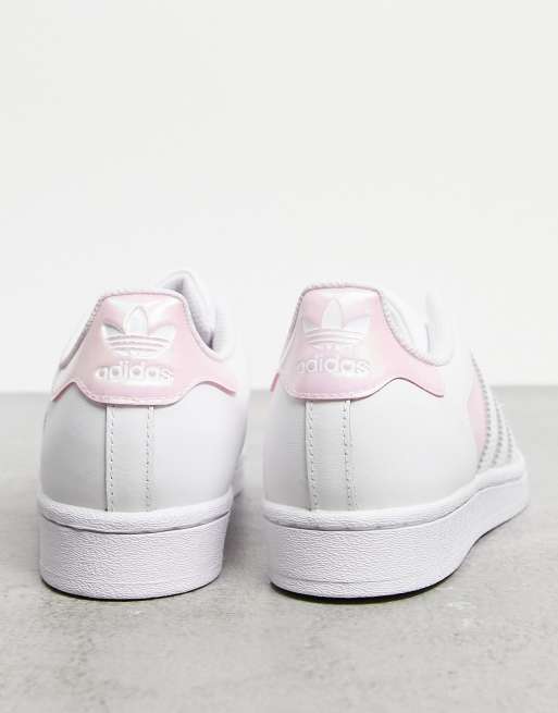 adidas Originals Superstar sneakers in white with pink detail