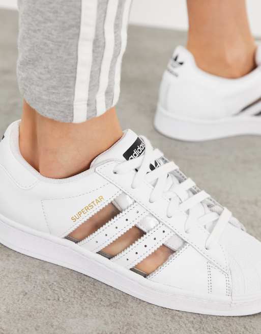 adidas Originals Superstar sneakers in white with transparent three stripes  | ASOS