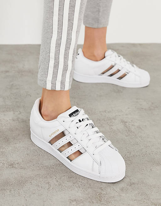 adidas Originals Superstar sneakers in white with transparent three stripes