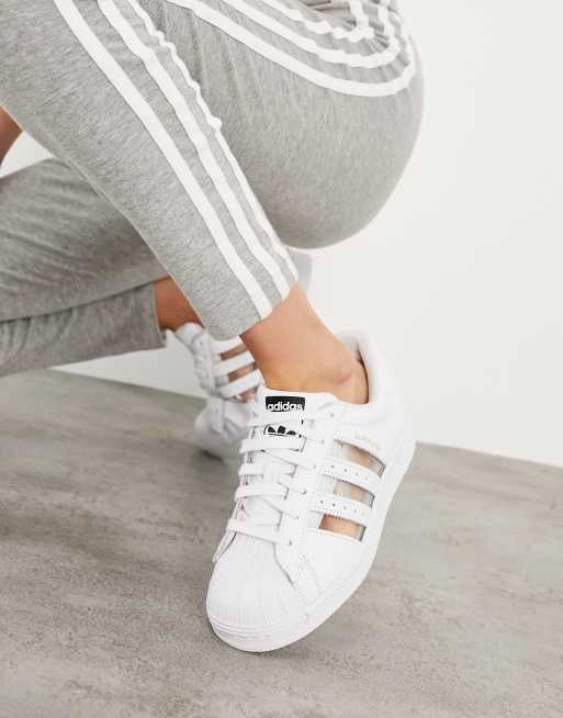 Adidas superstar white on sale stripes