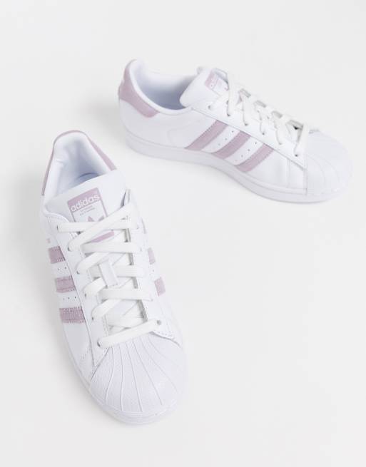 Haan Verder Afwijken Adidas Originals Superstar - Sneakers in wit en lila | ASOS