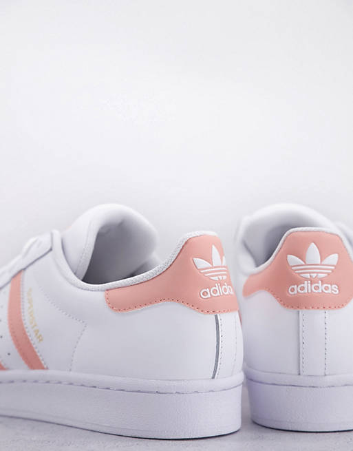 incompleet Pijnboom Alarmerend adidas Originals Superstar - Sneakers in wit met roze strepen | ASOS