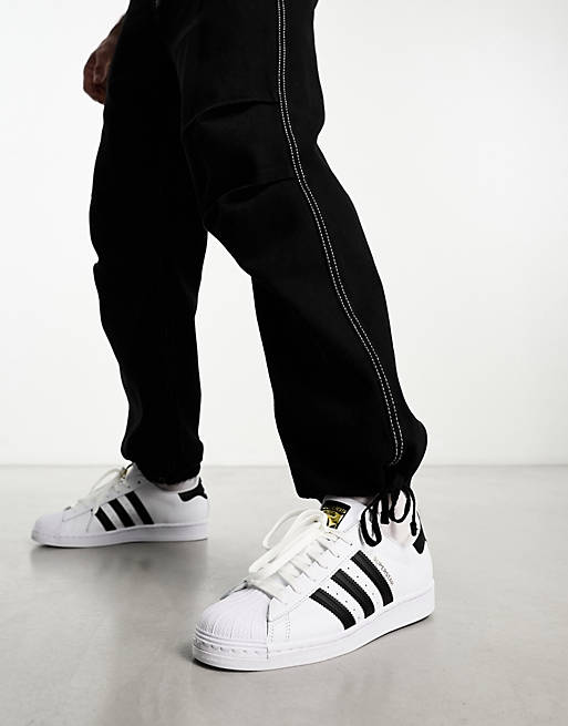 Hover Kwik Crack pot adidas Originals - Superstar - Sneakers in wit met zwart | ASOS