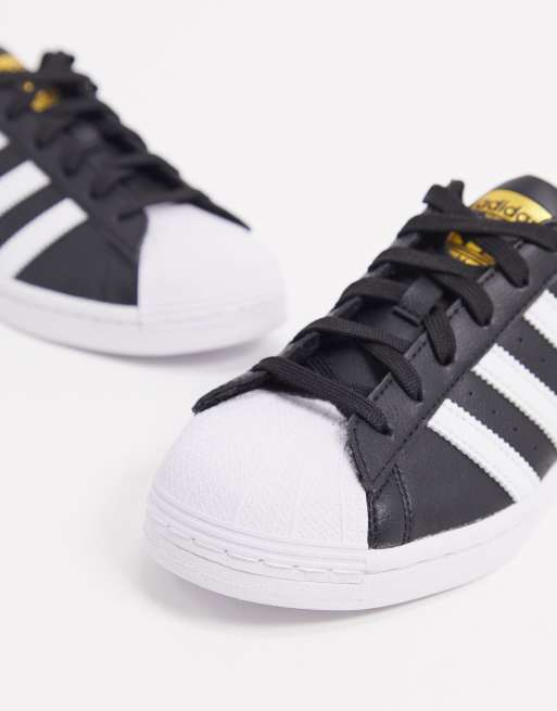 Superstar adidas shop nere e bianche