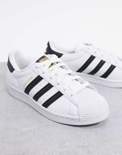 Adidas superstar bianche nere e oro online