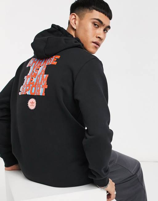adidas Originals Superstar - Sort hættetrøje med 'Change Is A Team Sport'-print på ryggen