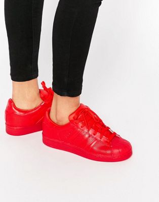 red colour sneakers shoes