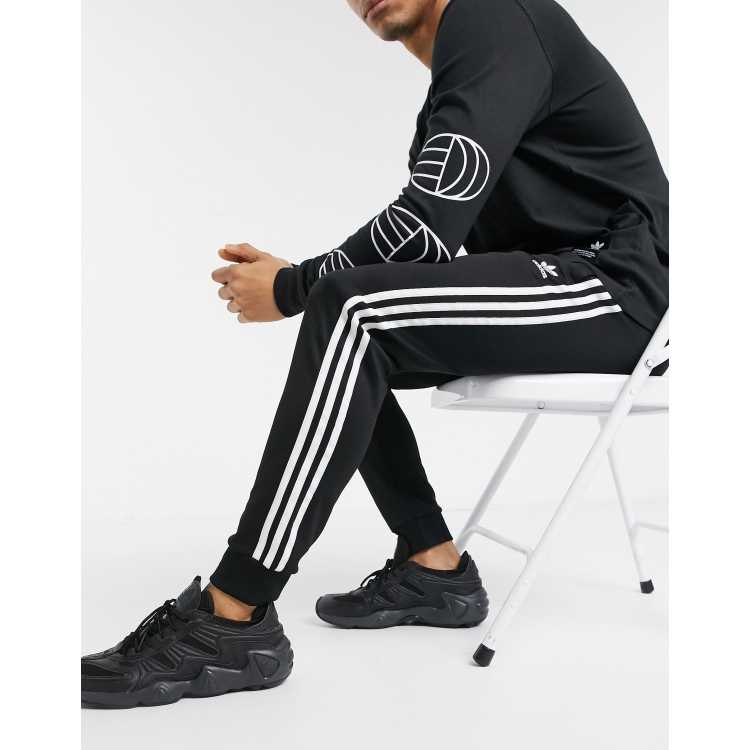 Adidas originals superstar skinny hot sale joggers cuffed in black