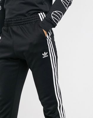 adidas originals superstar 3 stripe joggers in black