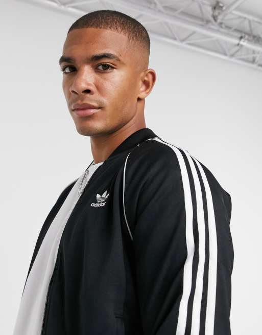 Adidas original three stripe track store jacket with vintage logo in black