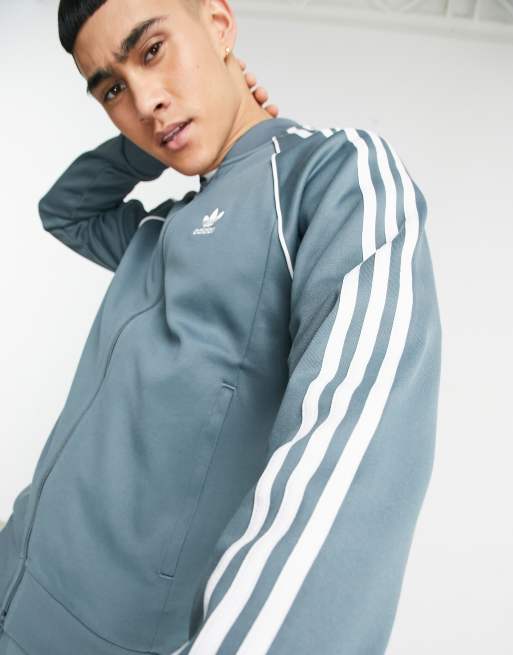 adidas Originals Superstar track jacket in blue oxide